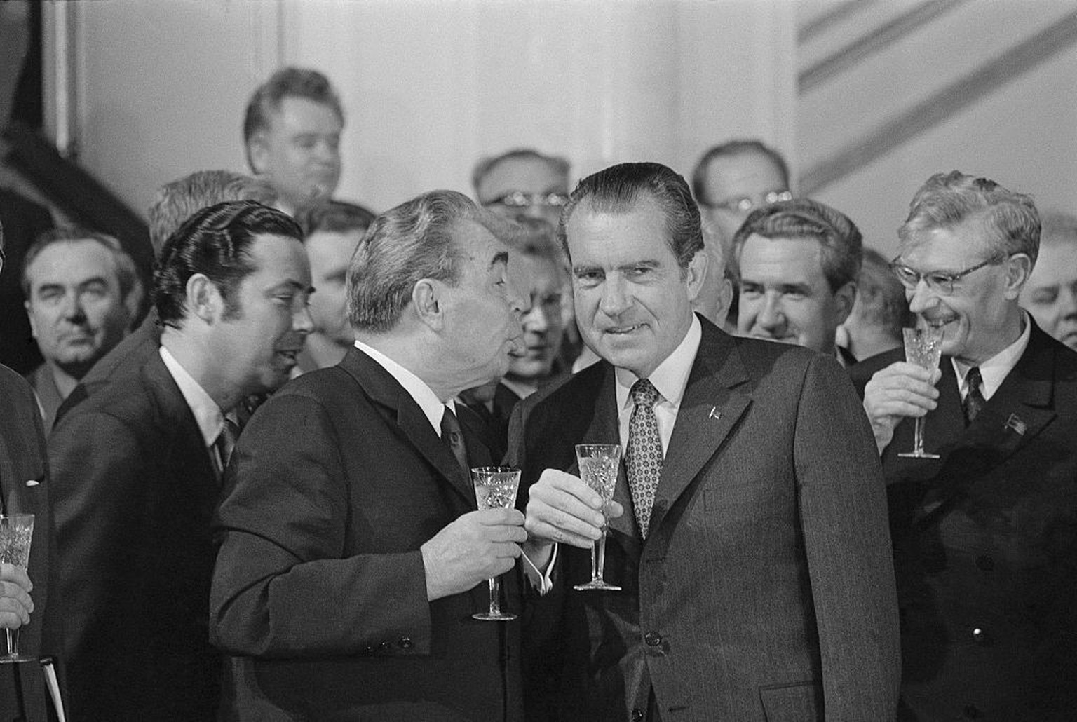 (Original Caption) General Secretary of the Soviet Communist Party Leonid I. Brezhnev, (L) offers a toast to President Richard Nixon following the signing of the Strategic Arms Limitation Pact here on ...