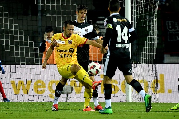 Lugano&#039;s player Fulvio Sulmoni, right, fights for the ball with, Xamax&#039; s player Raphael Nuzzolo left, during the Super League soccer match FC Lugano against FCS Neuchatel Xamax, at the Corn ...