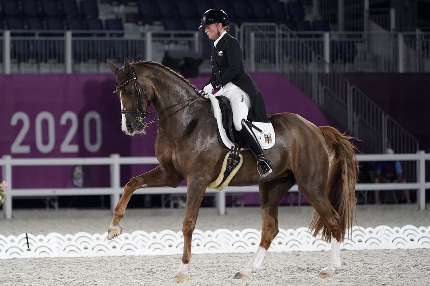 Germany&#039;s Isabell Werth, riding Bella Rose 2, competes in the equestrian dressage individual final at the 2020 Summer Olympics, Wednesday, July 28, 2021, in Tokyo. (AP Photo/David Goldman)
Isabel ...