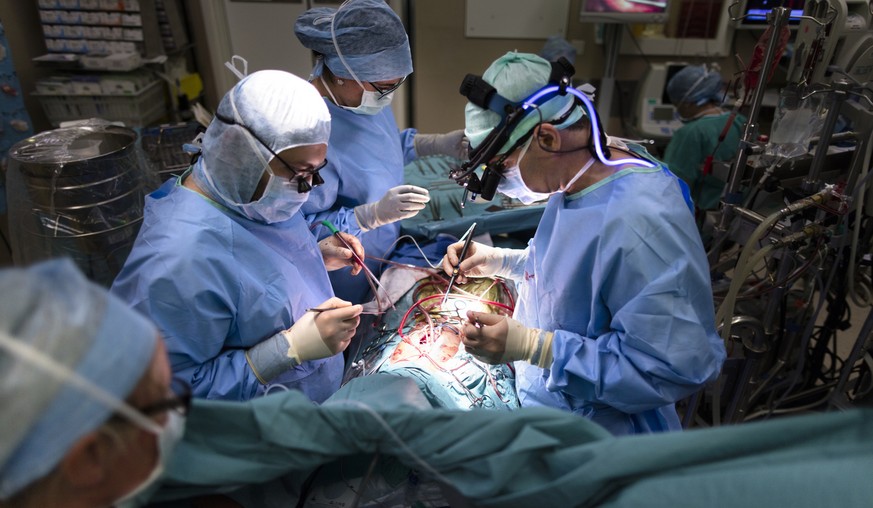 Swiss heart surgeon and pediatrician Rene Pretre and his team perform cardiac surgery on a two-year-old child at the Lausanne University Hospital, Centre Hospitalier Universitaire Vaudois, CHUV, in La ...