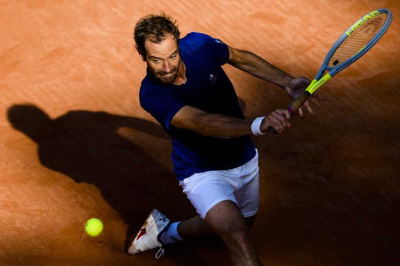 epa09958436 Richard Gasquet of France in action during his quarter-final match against Kamil Majchrzak of Poland at the ATP 250 Geneva Open Tennis tournament in Geneva, Switzerland, 19 May 2022. EPA/J ...