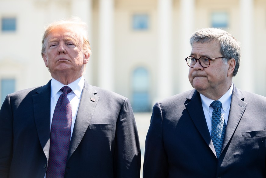 epa07873330 (FILE) - US President Donald J. Trump (L) stands next to Attorney General William Barr during the 38th annual National Peace Officers&#039; Memorial Service, at the US Capitol in Washingto ...