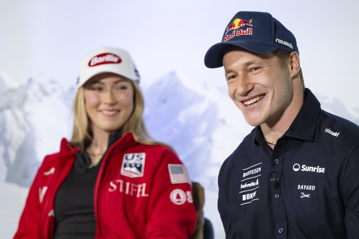 Marco Odermatt of Switzerland, right, speaks next to Mikaela Shiffrin of the United States during the FIS Race Talk at the FIS Alpine Skiing World Cup season opener, in Soelden, Austria, Friday, Octob ...