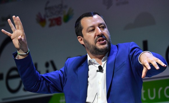 Italian Interior Minister and Deputy Premier Matteo Salvini gestures as he talks during the &#039;Labor Festival&#039; in Milan, northern Italy, Friday, June 29, 2018. (Daniel Dal Zennaro/ANSA via AP)