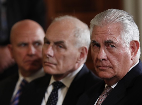 From left, National Security Adviser H.R. McMaster, White House Chief of Staff John Kelly, Secretary of State Rex Tillerson, and Vice President Mike Pence, sit in the front row during a joint news con ...