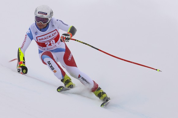 Switzerland&#039;s Jasmine Flury speeds down the course during an alpine ski, women&#039;s World Cup super-G in St. Moritz, Switzerland, Saturday, Dec. 11, 2021. (AP Photo/Marco Trovati)