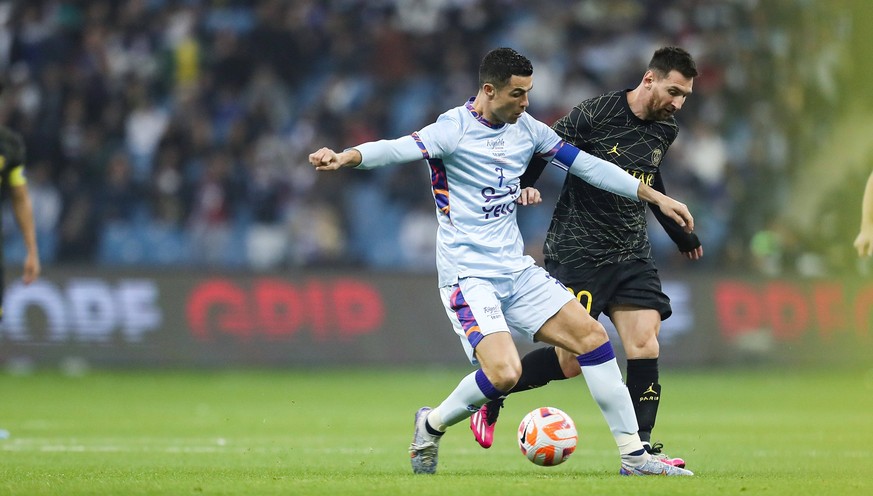 Riyadh All-Star XI vs Paris Saint-Germain FC Lionel Messi R and Cristiano Ronaldo in action during the Riyadh All-Star XI vs Paris Saint-Germain FC at King Fahd Stadium on January 19, 2023 in Riyadh,  ...