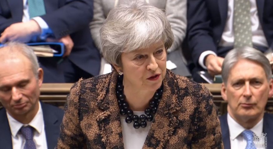 epa07306698 A handout video-grabbed still image from a video made available by the UK Parliamentary Recording Unit shows British Prime Minister Theresa May speaking in the House of Commons in London,  ...