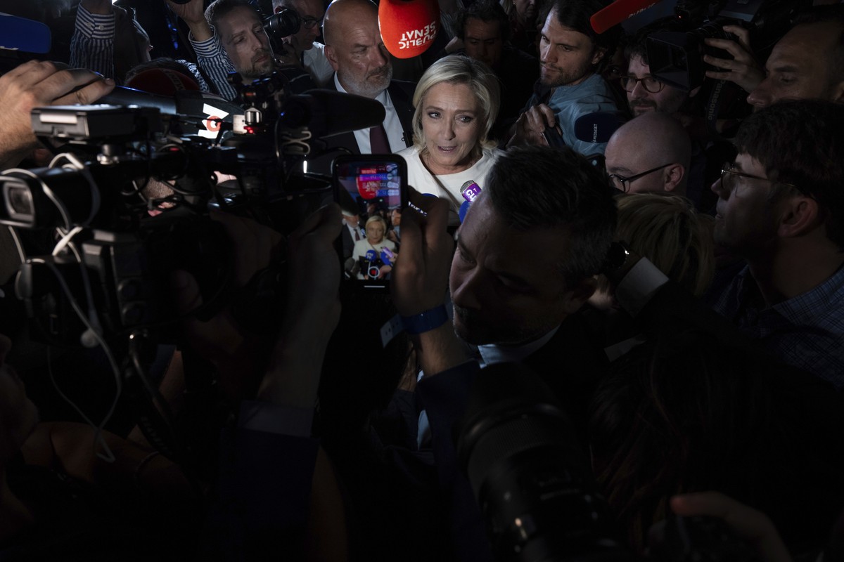 Far-right National Rally party leader Marine Le Pen answers reporters after the second round of the legislative election, Sunday, July 7, 2024, at the party election night headquarters in Paris. A coa ...