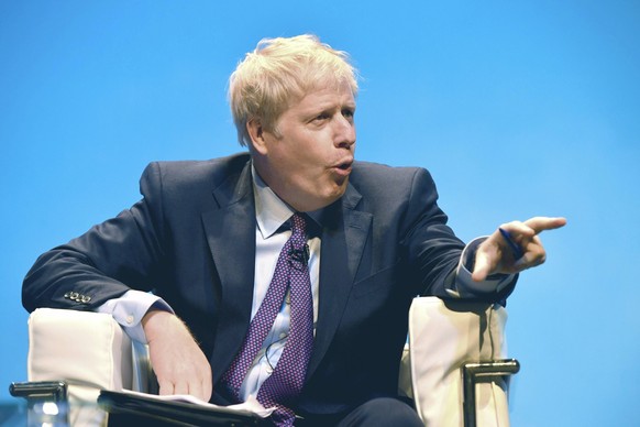 Conservative party leadership candidate Boris Johnson gestures, during the first party hustings at the ICC in Birmingham, England, Saturday June 22, 2019. (Ben Birchall/PA via AP)