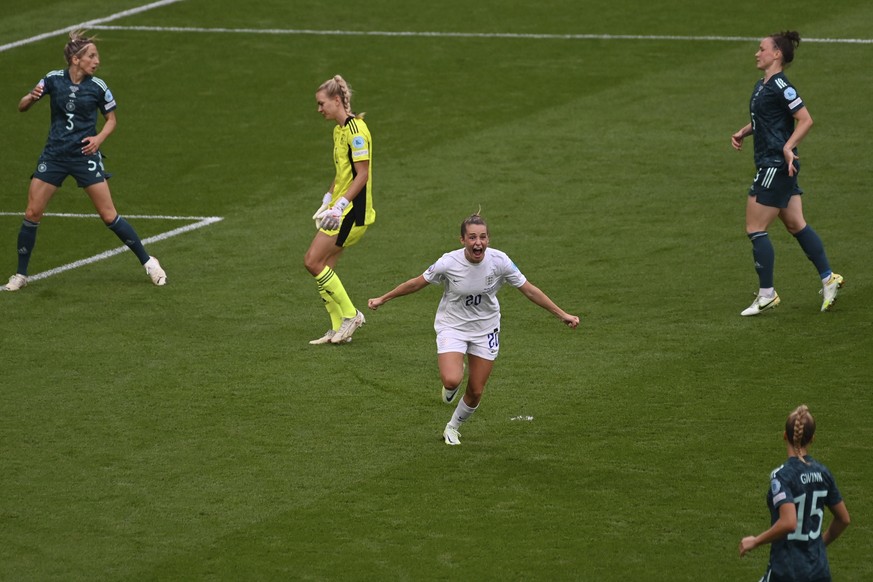 FILE - England&#039;s Ella Toone, centre, celebrates after scoring the opening goal during the Women&#039;s Euro 2022 final soccer match between England and Germany at Wembley stadium in London, Sunda ...