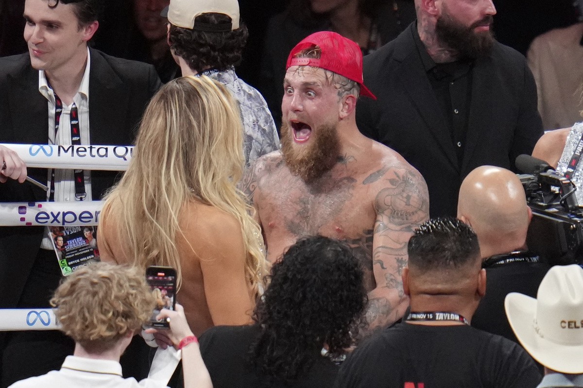 Jake Paul reacts after defeating Mike Tyson during their heavyweight boxing match, Friday, Nov. 15, 2024, in Arlington, Texas. (AP Photo/Julio Cortez)