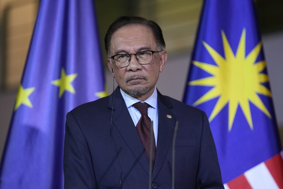 Malaysian Prime Minister Anwar Ibrahim attends a joint press conference with German Chancellor Olaf Scholz in the chancellory in Berlin, Monday, March 11, 2024. (AP Photo/Ebrahim Noroozi)
Anwar Ibrahi ...