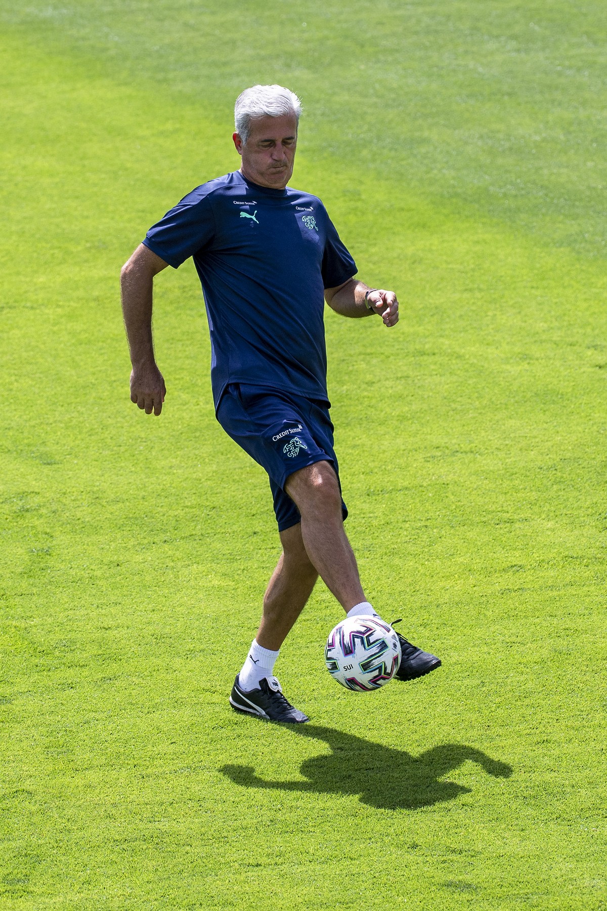 Switzerland's head coach Vladimir Petkovic plays the bal during a training session for the Euro 2020 soccer tournament at the Tre Fontane sports centre, in Rome, Italy, Tuesday, June 22, 2021. (K ...