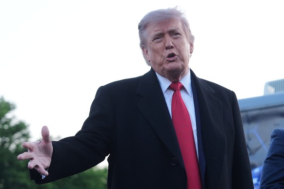 President Donald Trump speaks as he visits the Lincoln Memorial Reflecting Pool to see the new blue protective coating being applied as part of a renovation project, Thursday, May 7, 2026, in Washingt ...