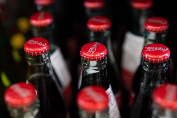 Bottles of Coca-Cola are displayed for sale at Hawthorne Market on Tuesday, Jan. 6, 2026, in Portland, Ore. (AP Photo/Jenny Kane)
Earns Coca Cola