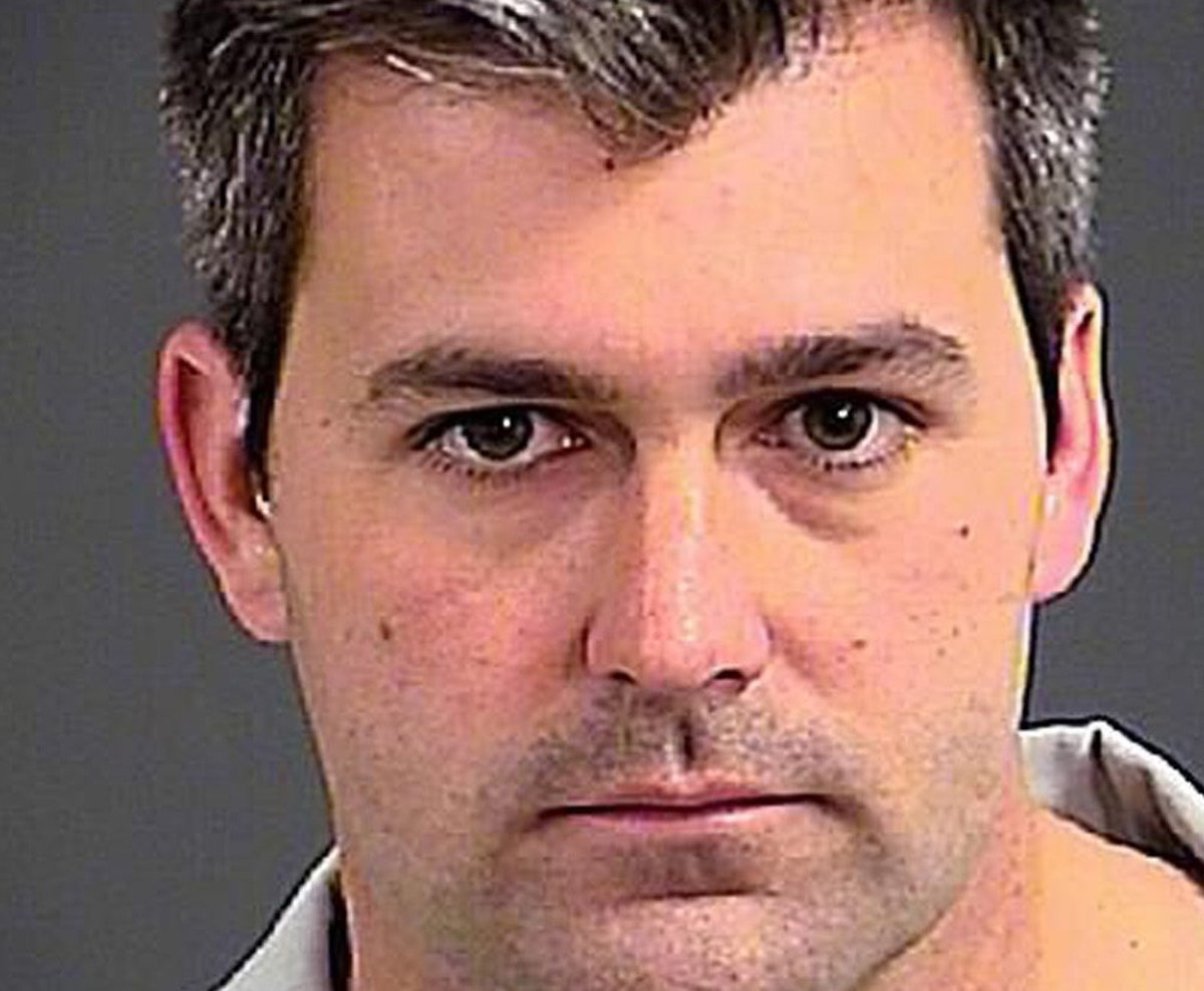 epa04695048 A handout booking photo issued by the Charleston County Sheriff's Office shows North Charleston police officer Michael Thomas Slager, in North Charleston, South Carolina, USA, 07 Apri ...