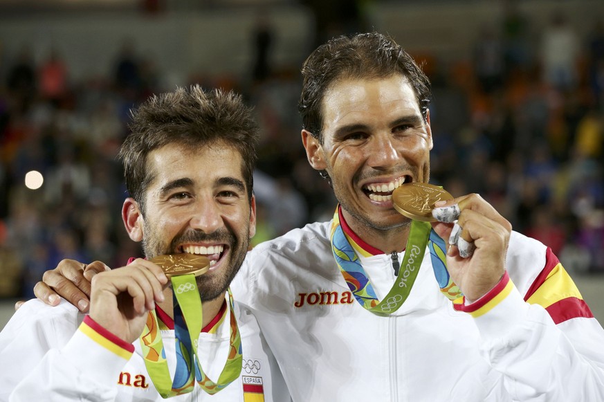 2016 Rio Olympics - Tennis - Victory Ceremony - Men&#039;s Doubles Victory Ceremony - Olympic Tennis Centre - Rio de Janeiro, Brazil - 12/08/2016. Rafael Nadal (ESP) of Spain and Marc Lopez (ESP) of S ...