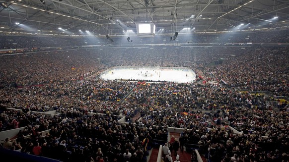A world record crowd of 77,803 spectators watching the opening group D match between Germany and the US at the World Ice Hockey Championships at the Veltins-Arena soccer stadium in Gelsenkirchen, Germ ...