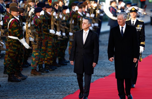 epa10324271 King Philippe of Belgium (R) welcomes Ignazio Cassis (L), President of the Swiss Confederation, during a state visit at the Royal Palace in Brussels, Belgium, 24 November 2022. Ignazio Cas ...