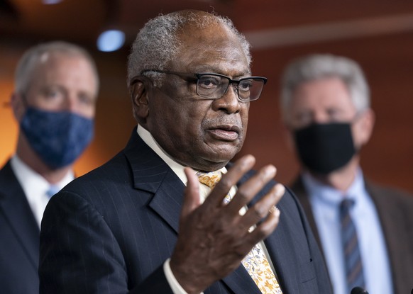 House Majority Whip James Clyburn, D-S.C., talks with reporters after the House approved the Democrats&#039; social and environment bill, giving a victory to President Joe Biden, at the Capitol in Was ...