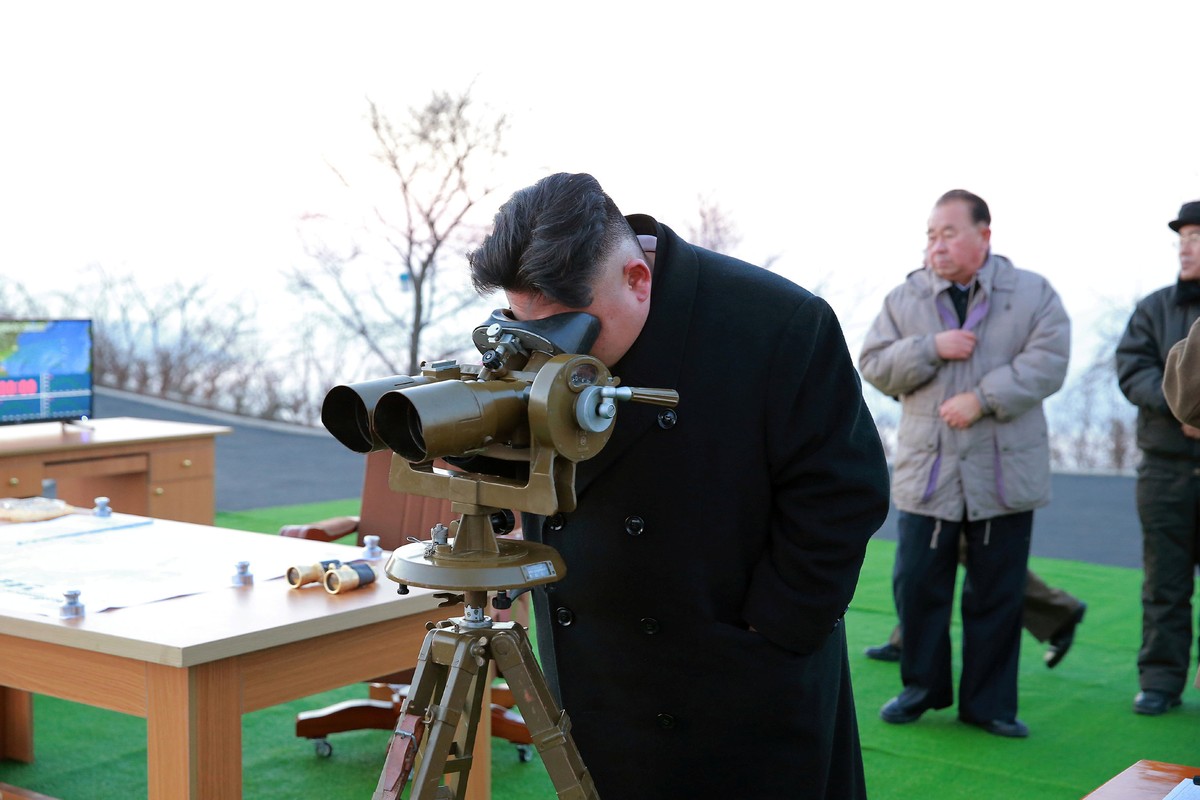 North Korean leader Kim Jong Un supervised a ballistic rocket launching drill of Hwasong artillery units of the Strategic Force of the KPA on the spot in this undated photo released by North Korea ...