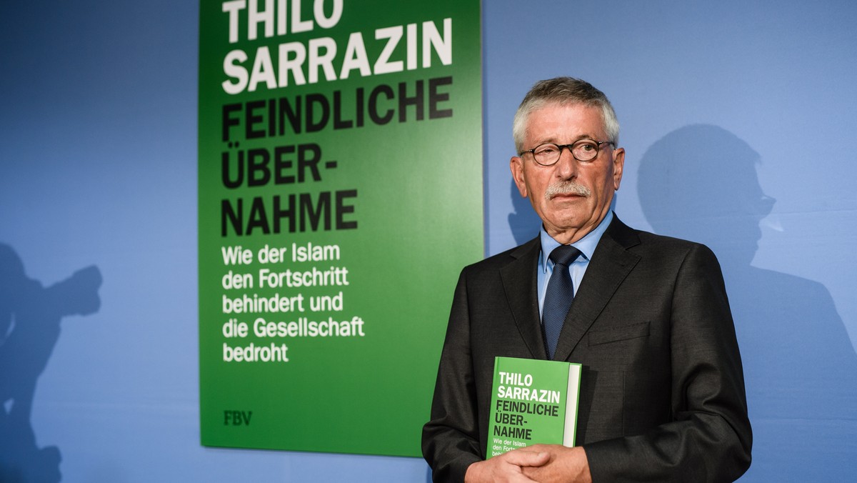 epa06983222 Former Berlin Senator for Finance and Executive Board member of the Bundesbank, Thilo Sarrazin, poses at the podium during the presentation of his new book, 'Feindliche Uebernahme. Wi ...