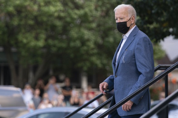 President Joe Biden leaves St. Edmund Roman Catholic Church in Rehoboth Beach, Del., after attending a Mass, Saturday, Sept. 18, 2021. Biden is spending the weekend at his Rehoboth Beach home. (AP Pho ...
