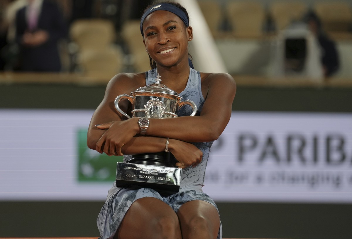 Coco Gauff of the U.S. celebrates with the trophy as she won the final match of the French Tennis Open against Aryna Sabalenka of Belarus at the Roland-Garros stadium in Paris, Saturday, June 7, 2025. ...