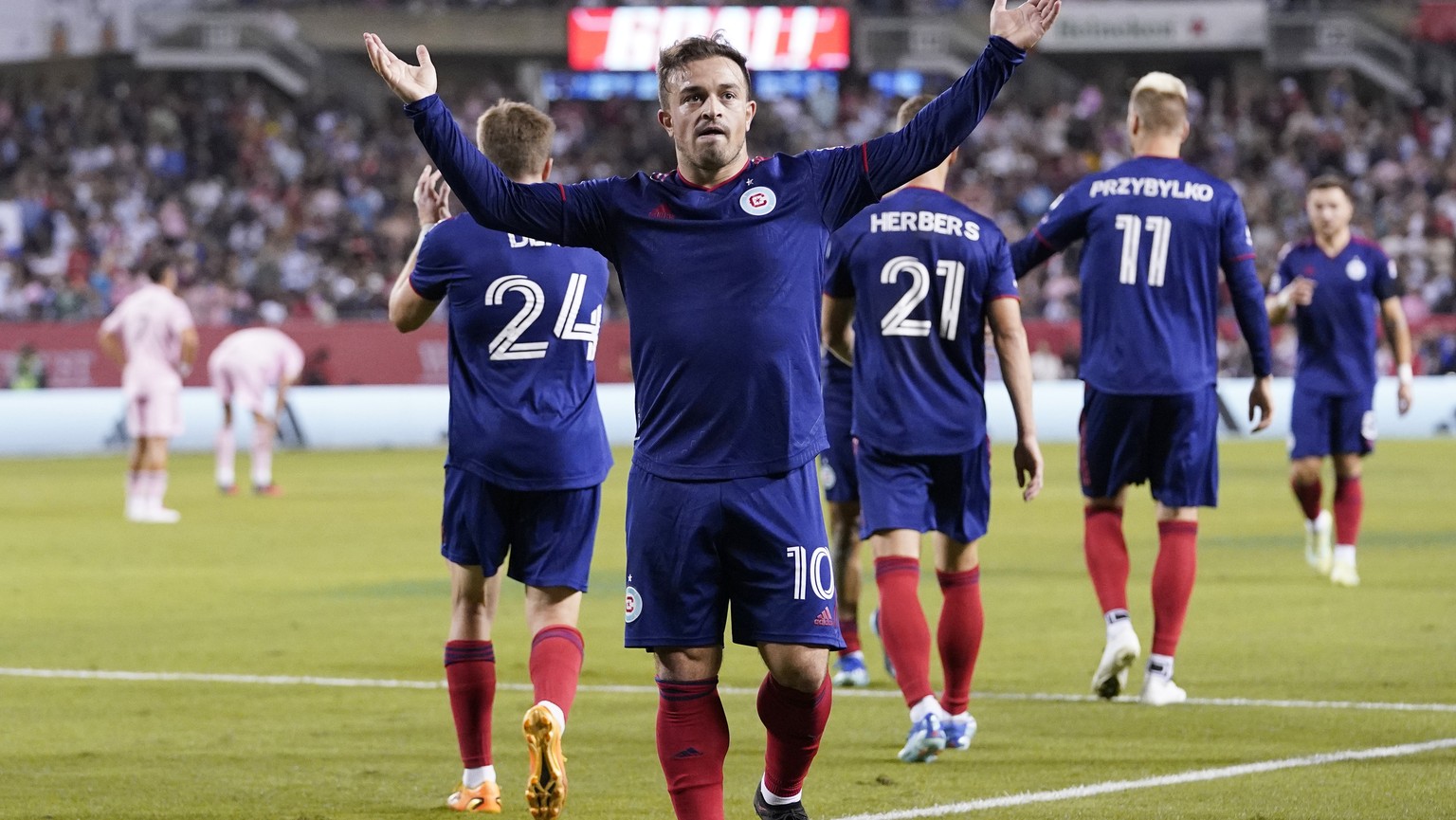 Chicago Fire midfielder Xherdan Shaqiri celebrates after scoring his second goal during the second half of an MLS soccer game against the Inter Miami in Chicago, Wednesday, Oct. 4, 2023. (AP Photo/Nam ...