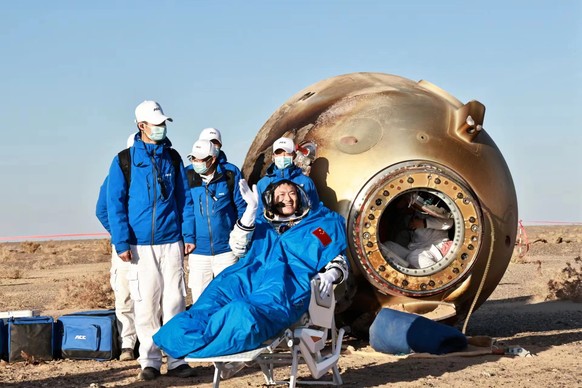 epa10950030 Astronaut Gui Haichao is out of the return capsule of the Shenzhou-16 manned spaceship at the Dongfeng Landing Site in north China&#039;s Inner Mongolia Autonomous Region, 31 October 2023. ...