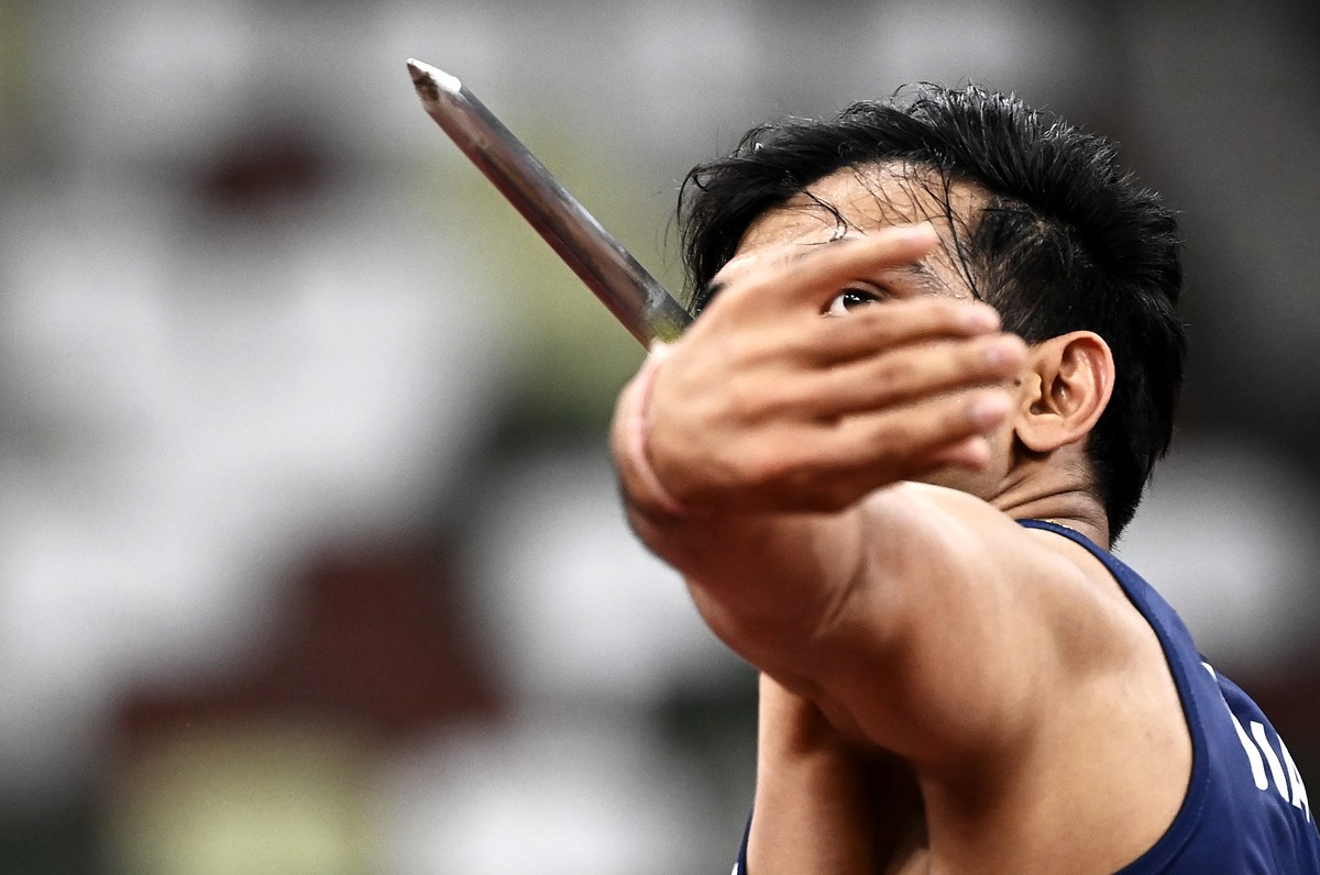 epa09620917 Neeraj Chopra of India competes the Men's Javelin Throw final during the Athletics events of the Tokyo 2020 Olympic Games at the Olympic Stadium in Tokyo, Japan, 07 August 2021. EPA/C ...