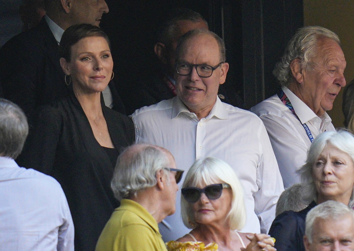 Prince Albert II of Monaco, right, and his wife Princess Charlene attend the Rugby World Cup Pool B match between South Africa and Scotland at the Stade de Marseille in Marseille, France, Sunday, Sept ...