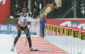 epa04126836 Selina Gasparin of Switzerland in action during the Women's 7,5 km sprint race at the IBU Biathlon World Cup in Kontiolahti, Finland, 15 March 2014.  EPA/MAURI RATILAINEN FINLAND OUT