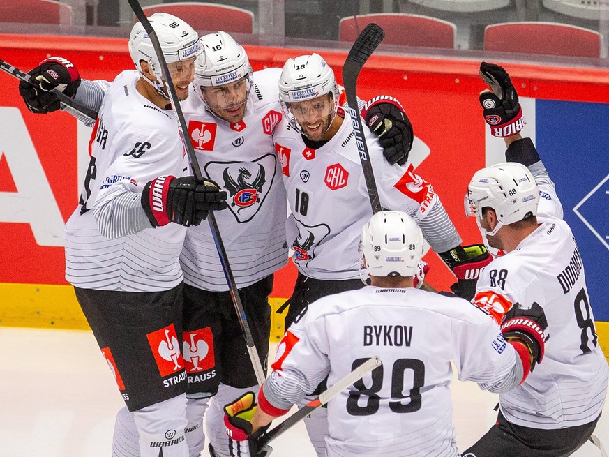 Players of Fribourg L-R Julien Sprunger, Raphael Diaz, Ryan Gunderson, Andrej Bykov and Christopher Didomenico celebrate victory in the hockey Champions League group F game HC Ocelari Trinec vs Fribou ...