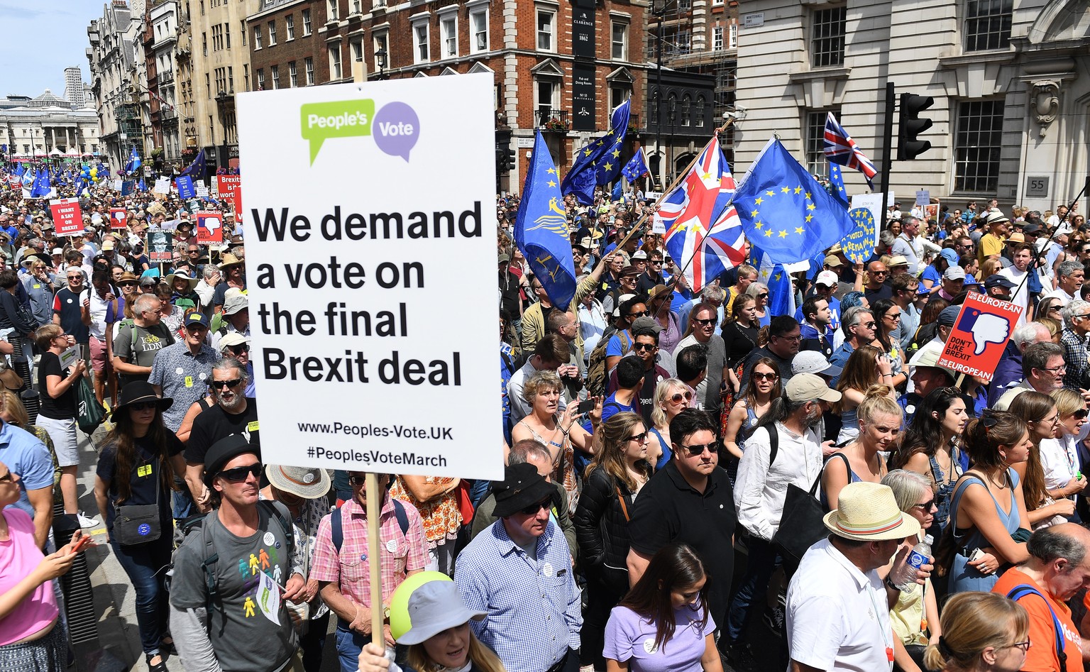epa06833223 Tens of thousands of people march through London during a People's March Anti Brexit demonstration in London, Britain, 23 June 2018. Protesters are calling for a referendum on the final de ...