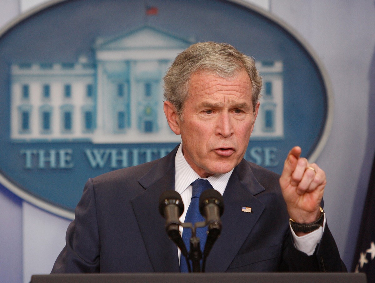 President George W. Bush gestures during a news conference, Monday, Jan. 12, 2009, in the pressroom at the White House in Washington. (AP Photo/Ron Edmonds)