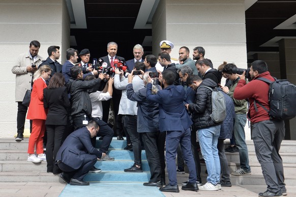 epa10894024 Turkish Minister of Interior, Ali Yerlikaya (C-L) speaks to reporters after a suicide attack near the Turkish Interior Ministry in Ankara, Turkey, 01 October 2023. According to the Interio ...