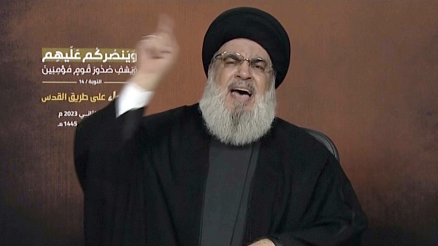 This video grab shows Hezbollah leader Sayyed Hassan Nasrallah speaking via a video link, during a rally in Beirut, Friday, Nov. 3, 2023. Nasrallah said Friday that his powerful militia is already eng ...