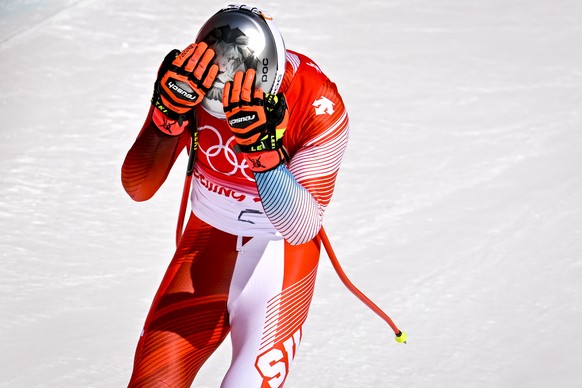 epa09724237 Marco Odermatt of Switzerland reacts during the Men&#039;s Downhill Training at the Yanqing National Alpine Skiing Centre for the Beijing 2022 Olympic Winter Games in Beijing, China, 03 Fe ...