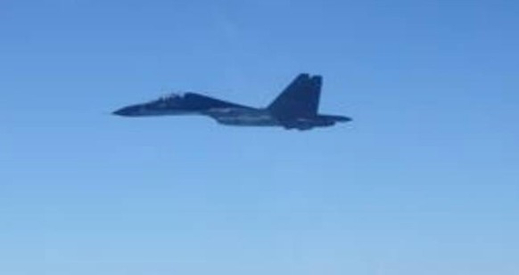 epa09502485 A handout photo made available by Taiwan Ministry of National Defense on 02 October 2021 shows a Chinese PLA Sukhoi SU-30 fighter, following the incursion of nineteen Chinese PLA warplanes ...