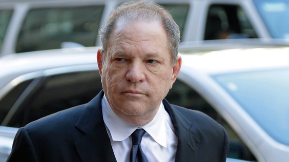 FILE - In this July 9, 2018 file photo, Harvey Weinstein arrives to court in New York. Prosecutors say Weinstein has been charged with the rape of two more women in Los Angeles County. The district at ...