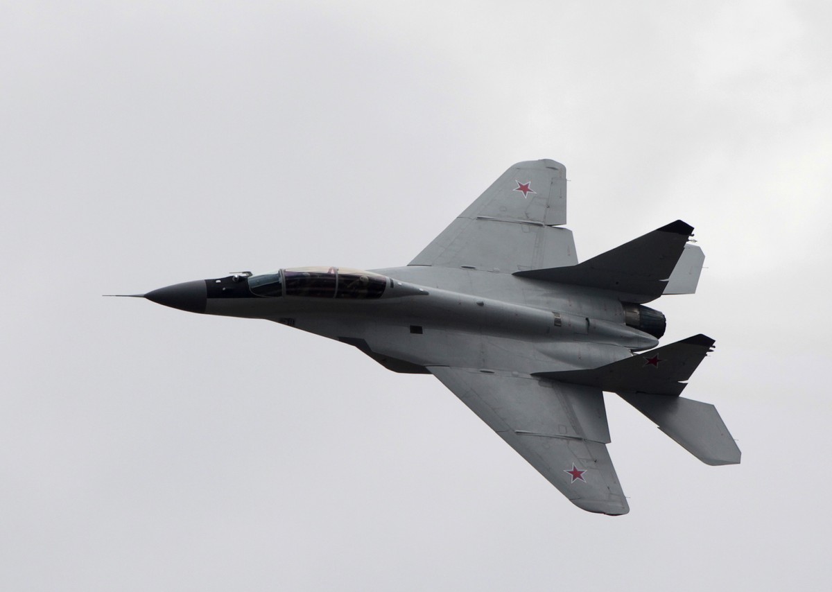FILE - A Russian MIG-29 plane performs a flight during a celebration marking the Russian air force's 100th anniversary in Zhukovsky, outside Moscow, Russia on Aug. 11, 2012. Slovakia's defen ...