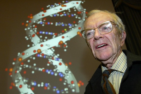 Professor Maurice Wilkins stands before a double helix structure of deoxyribonucleic acid (DNA) at an event in London Tuesday April 22, 2003 to celebrate the 50th anniversary of the dicovery of DNA. W ...