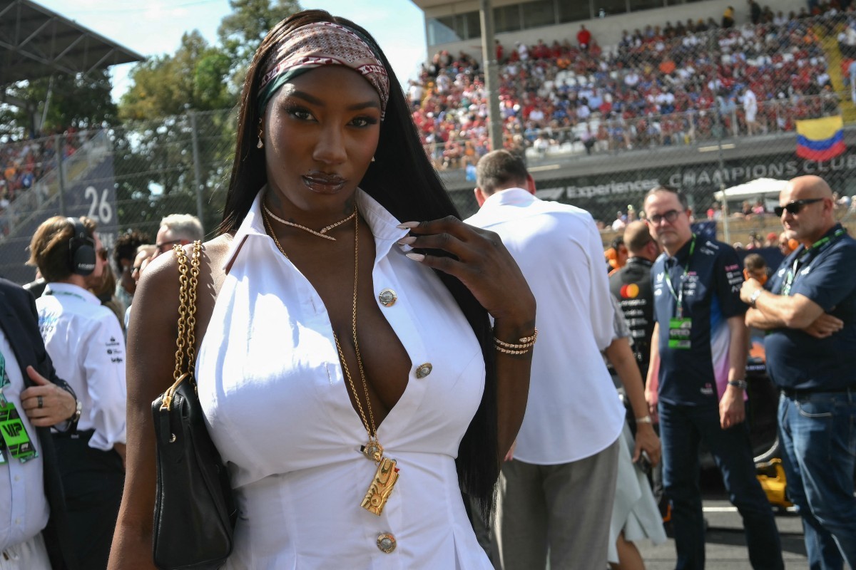 French singer Aya Nakamura poses on the starting grid prior to the Italian Formula One Grand Prix at the Autodromo Nazionale Monza circuit, in Monza, northern Italy, on September 7, 2025. (Photo by Ma ...