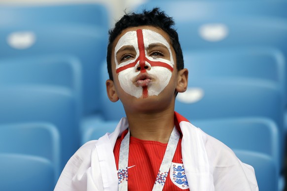 An England fan gestures prior the quarterfinal match between Sweden and England at the 2018 soccer World Cup in the Samara Arena, in Samara, Russia, Saturday, July 7, 2018. (AP Photo/Matthias Schrader ...