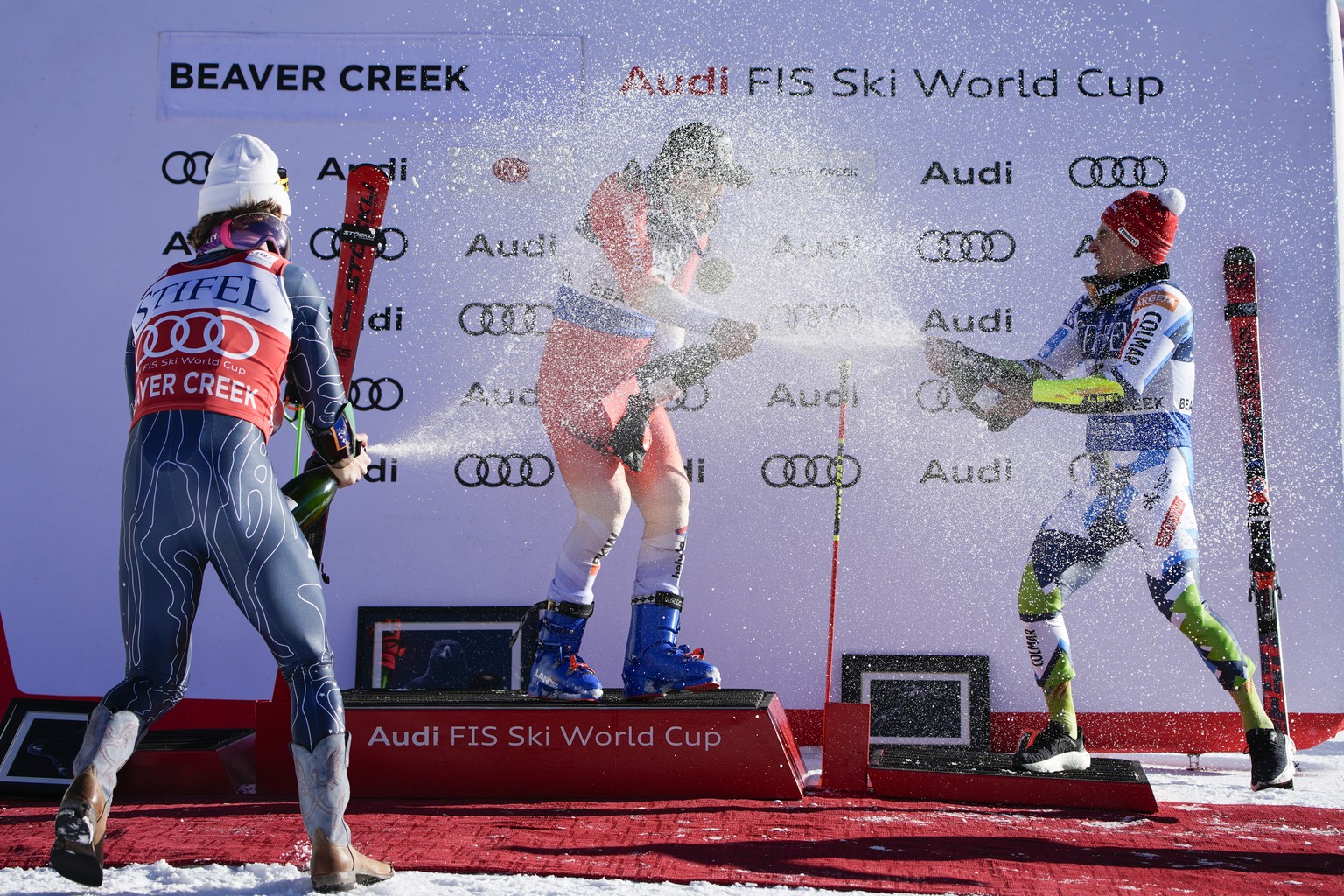 From left, second place finisher Brazil&#039;s Lucas Pinheiro Braathen, first place finisher Switzerland&#039;s Thomas Tumler, and third place finisher Slovenia&#039;s Zan Kranjec celebrate after a me ...