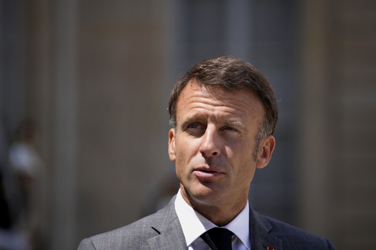 FILE - French President Emmanuel Macron, speaks to medias during a press conference at the Elysee Palace in Paris, on July 21, 2023. President Emmanuel Macron says France will end its military presenc ...