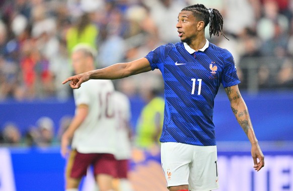 epa13111514 Michael Olise of France gestures in action during the FIFA World Cup 2026 semifinals match France against Spain, in Dallas, USA, 14 July 2026. EPA/SAM WASSON