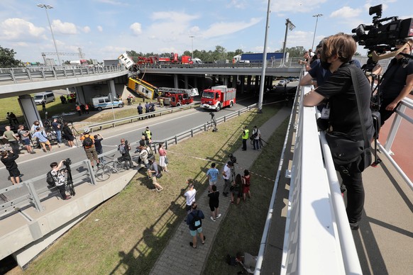 epa08508698 Emergency services at the site of a fatal Warsaw&#039;s city bus crash in Warsaw, Poland, 25 June 2020. According to reports, one person has died and 17 others, including five in serious c ...